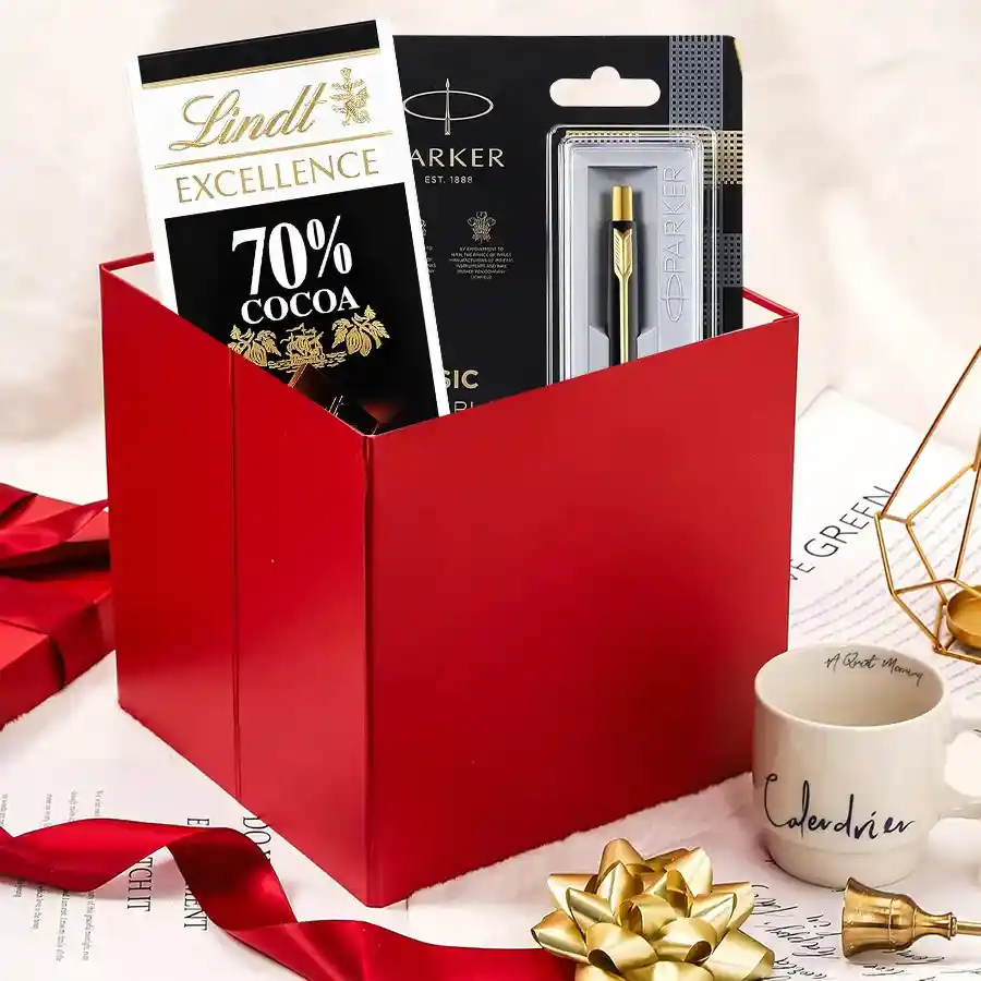 Zesty Illusion Gift Set featuring Lindt Excellence Chocolates and a stylish Parker Pen Set in an elegant box
