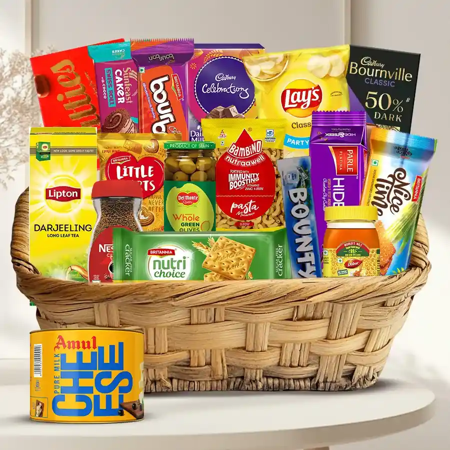 Utmost Desire Gift Collection featuring an assortment of Cadbury chocolates, Lays chips, Darjeeling tea, premium coffee, gourmet biscuits, honey, and Tic Tac, beautifully packaged.