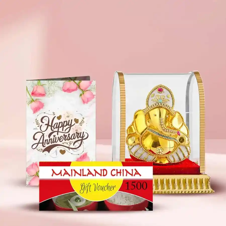 Attractive combo of a 2-tier bamboo plant, an anniversary card, and a Mainland China E Voucher on a wooden table