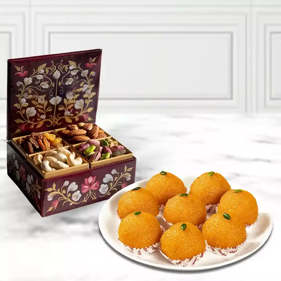 Haldirams Ladoo and Mixed Dry Fruits Box containing Boondi Ladoos, raisins, almonds, cashews, and pistachios