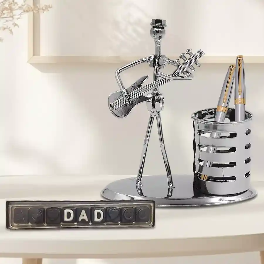 Exclusive Gift Combo for Dad featuring two premium Parker ballpoint pens, a designer metallic pen stand, and handmade chocolates with a "DAD" message.