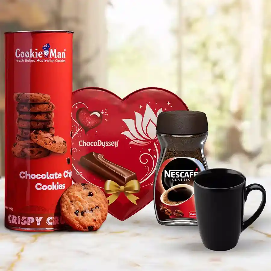 Yummy Coffee Lovers Hamper with coffee mug, Nescafe coffee, heart-shaped chocolates, and assorted cookies