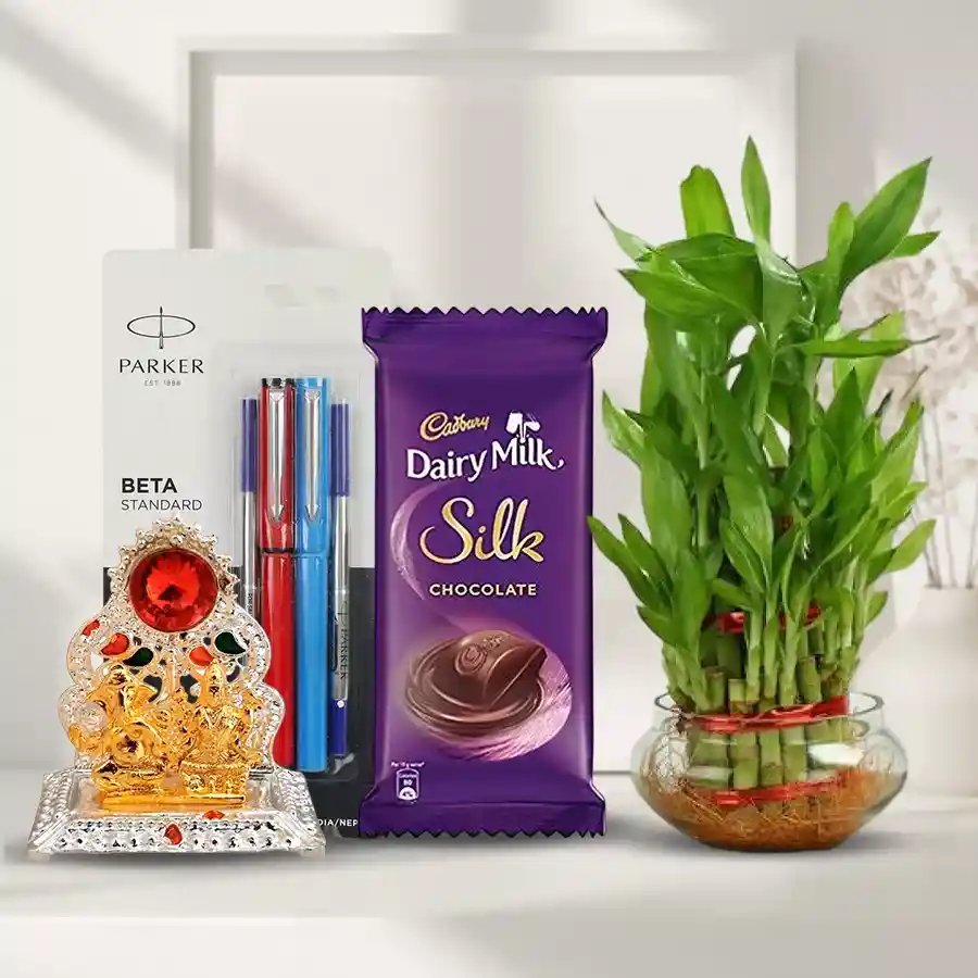 Good Luck Gift Combo featuring a 2-Tier Lucky Bamboo Plant, Laxmi Ganesh Mandap, Parker Beta Pen Set, and Cadbury Dairy Milk Silk bar.