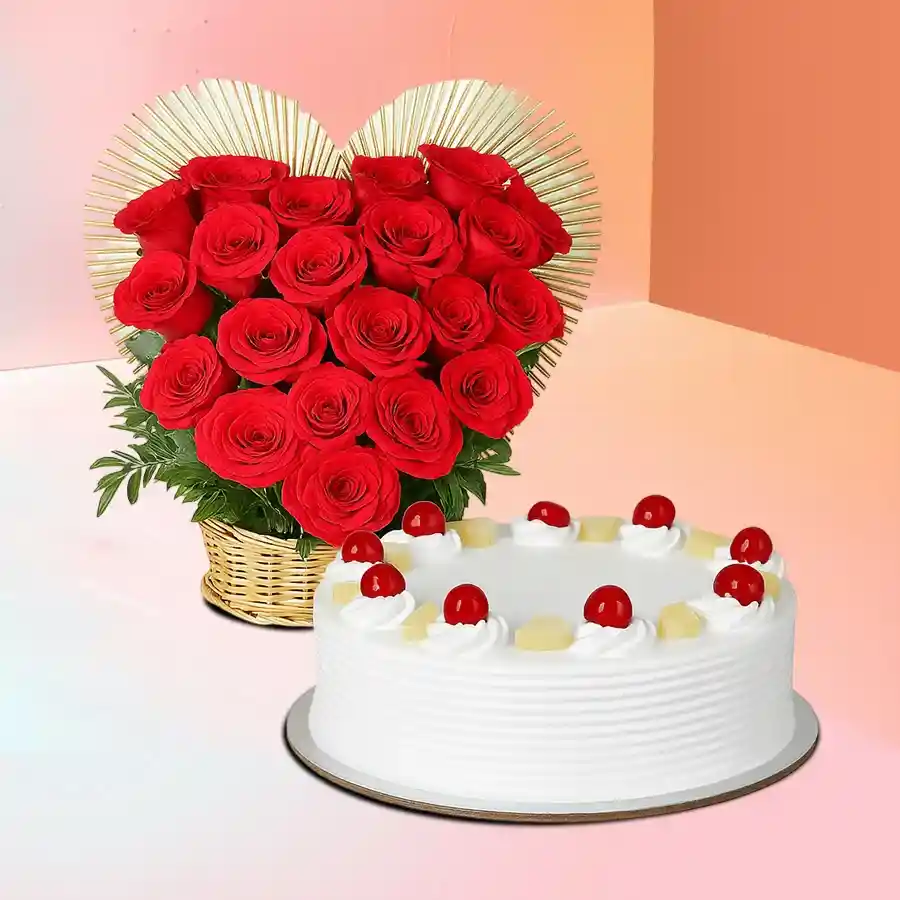 1 kg Pineapple Cake from 5 Star Bakery with heart-shaped red rose arrangement, perfect for special celebrations.