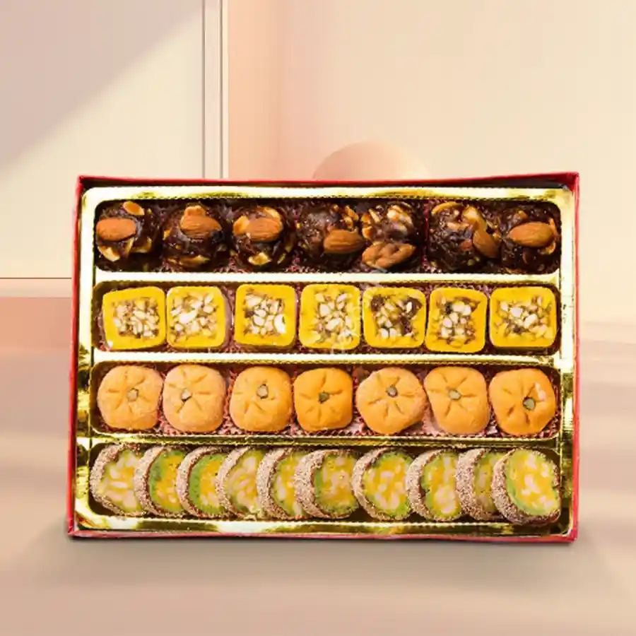 Blissful Assorted Sweets Collection in a charming box, perfect for sharing joy.