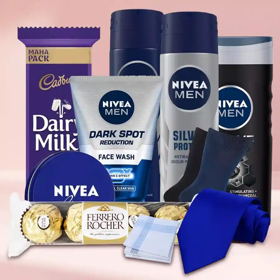Nivea Grooming Kit for Men featuring shower gel, face wash, talc, deodorant, Nivea cream, chocolates, tie, handkerchiefs, and socks arranged in an elegant packaging.