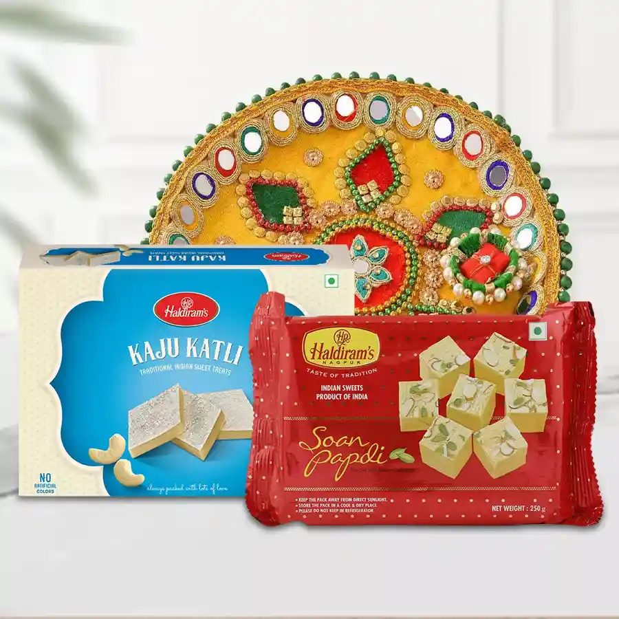 Haldirams Sweets Combo featuring Kaju Katli, Soan Papdi, and an elegantly designed Pooja Thali