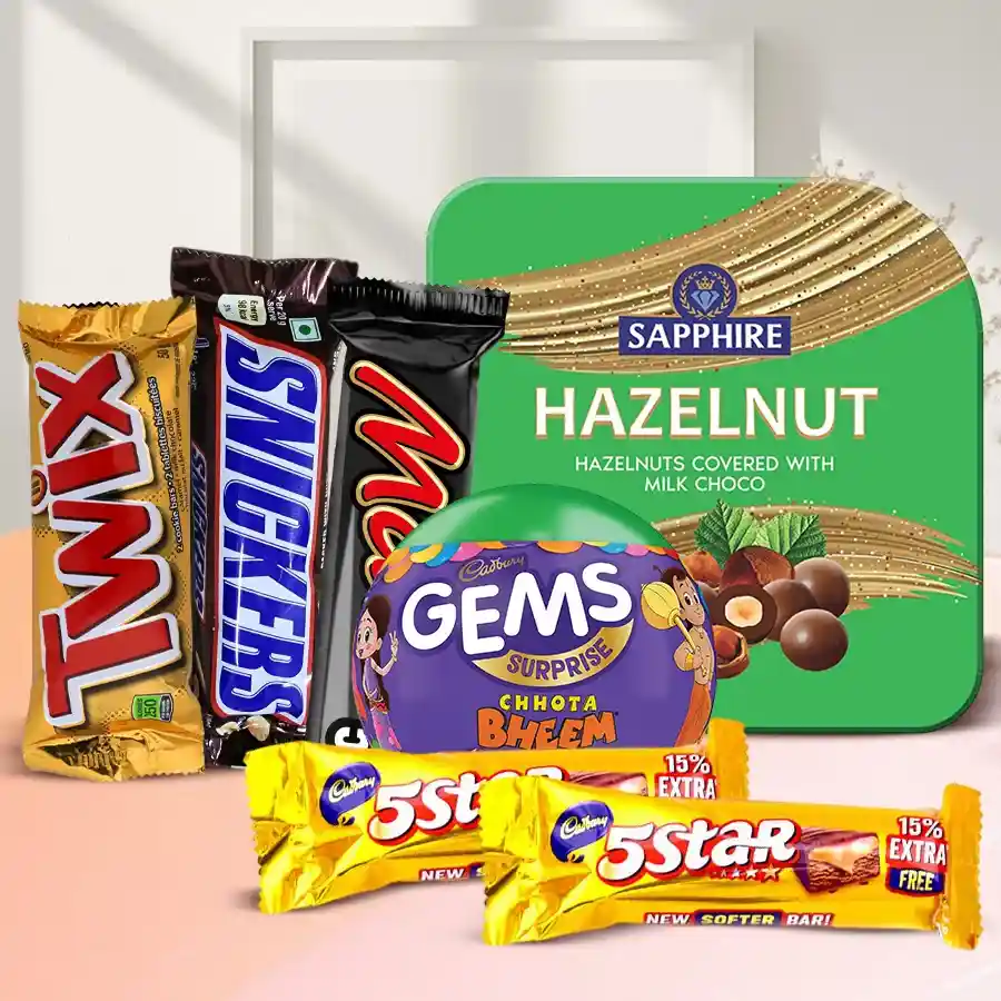 Sumptuous Holiday Treat Chocolate Hamper filled with Cadbury 5 Star, Snickers, Twix, Cadbury Gems Surprise, Mars, and a Sapphire Chocolate Tin