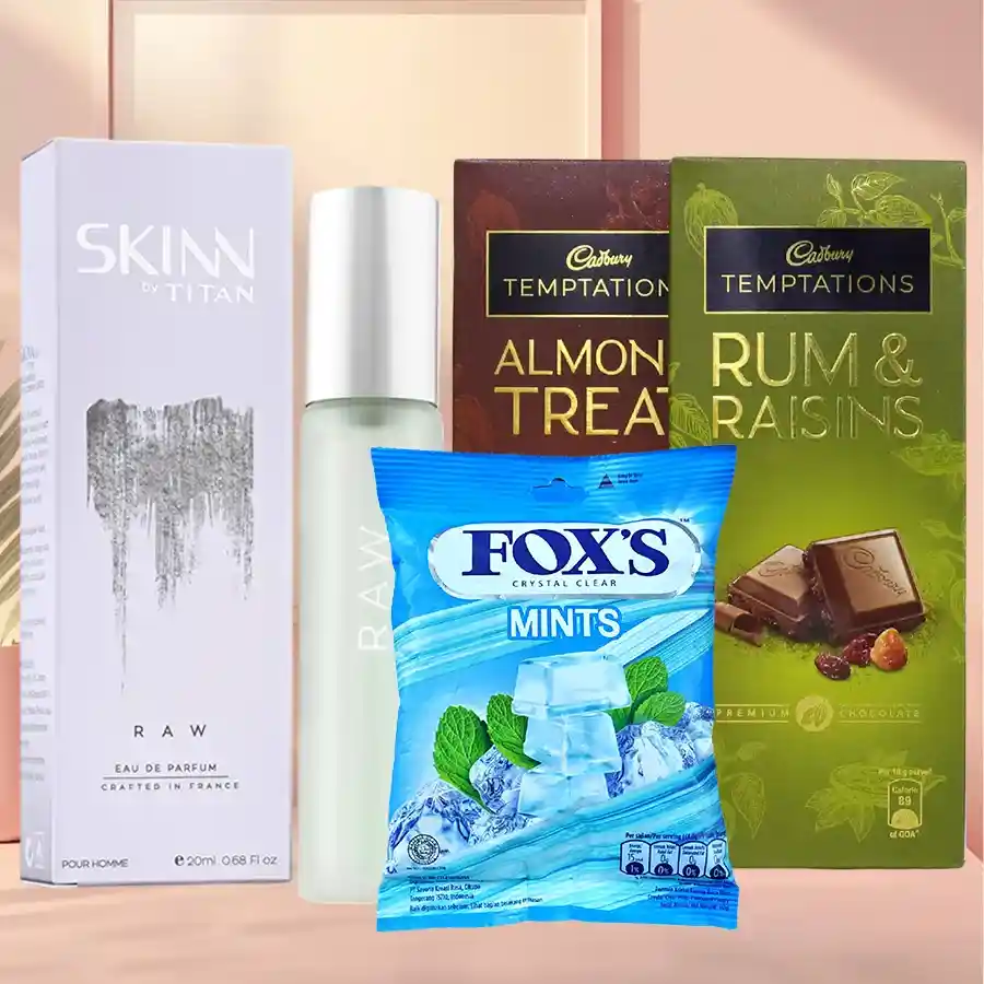 Gratifying Chocolate Hamper with Skinn Raw Perfume featuring a 20ml EDT, Foxes Mint Candy, and Cadbury Temptation bars in Rum & Raisin and Almond flavors.