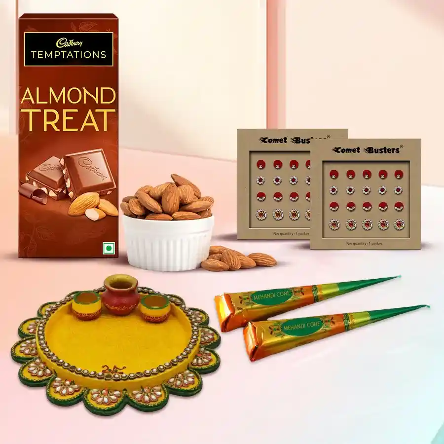 Karwa Chauth gift hamper for Bahu including pooja thali, Cadbury almonds chocolate, almonds, mehndi cones, and designer bindi pack.