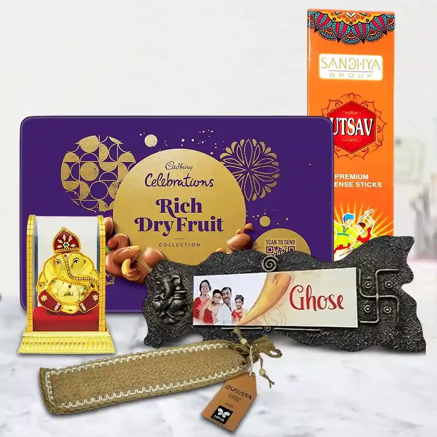 Stunning personalized gift combo for housewarming featuring a custom name plate, chocolate box, Ganesh idol, aromatic agarbatti, and elegant ash catcher.