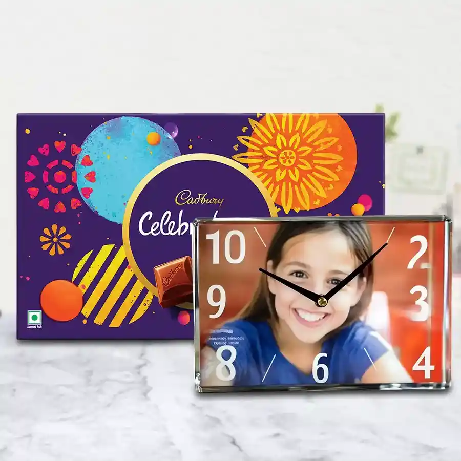 Personalized glass table clock with a photo, Cadbury Celebrations chocolate pack beside it