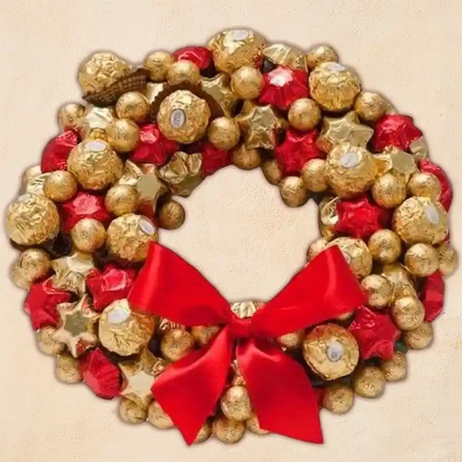 Elegant Christmas wreath made of handmade chocolates and Ferrero Rocher