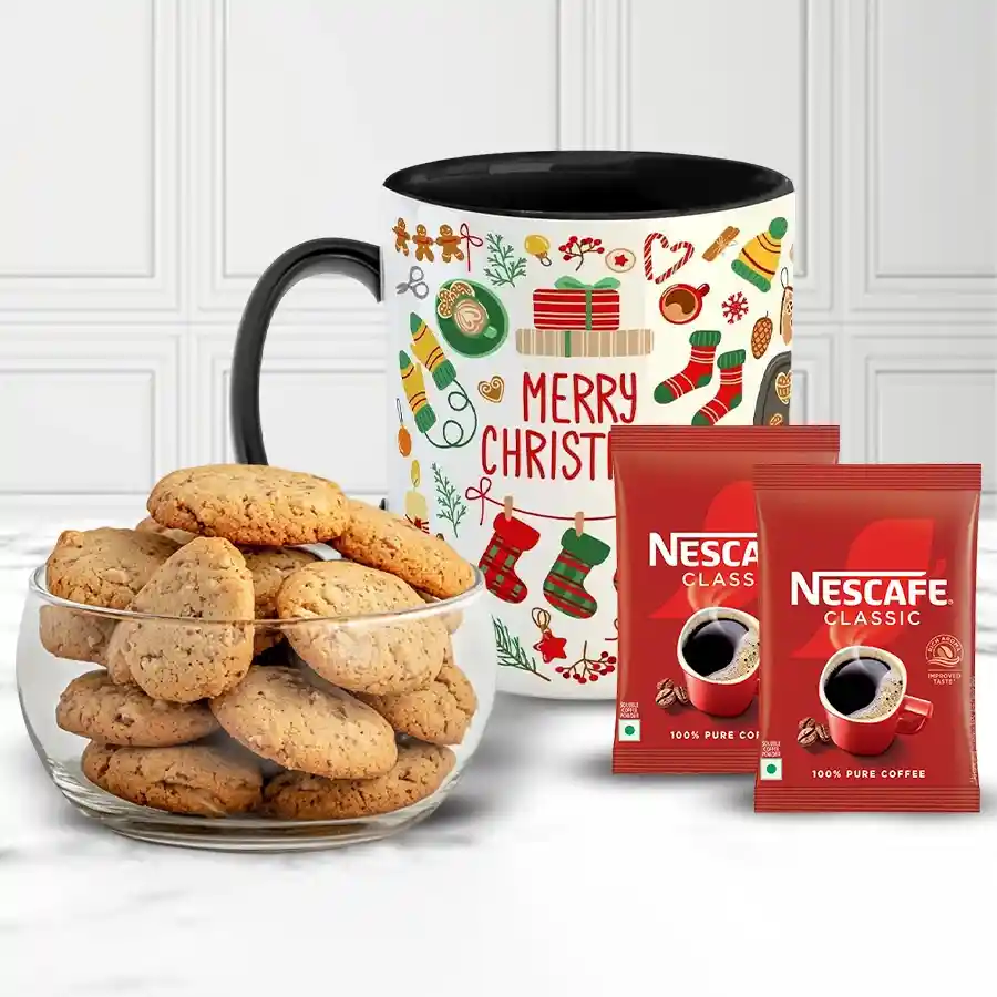 Personalized Christmas gift set with almond cookies, Nescafé coffee packs, and a "Merry Christmas" mug
