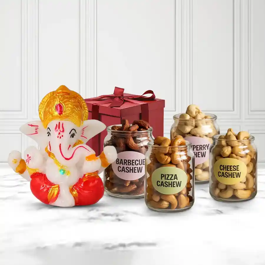 Superb Marble Ganesha idol with flavored cashews gift combo in an elegant box
