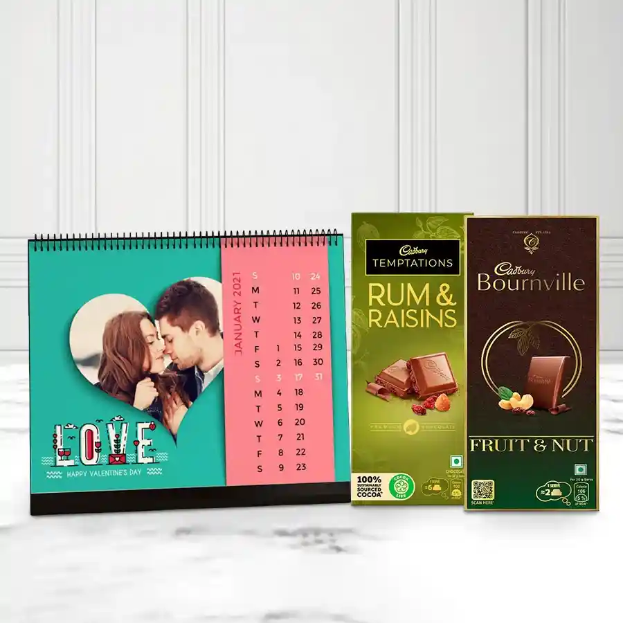 Personalized desk calendar with custom photos and Cadbury chocolate duo box featuring Rum & Raisin and Fruit & Nut Dark Chocolate.