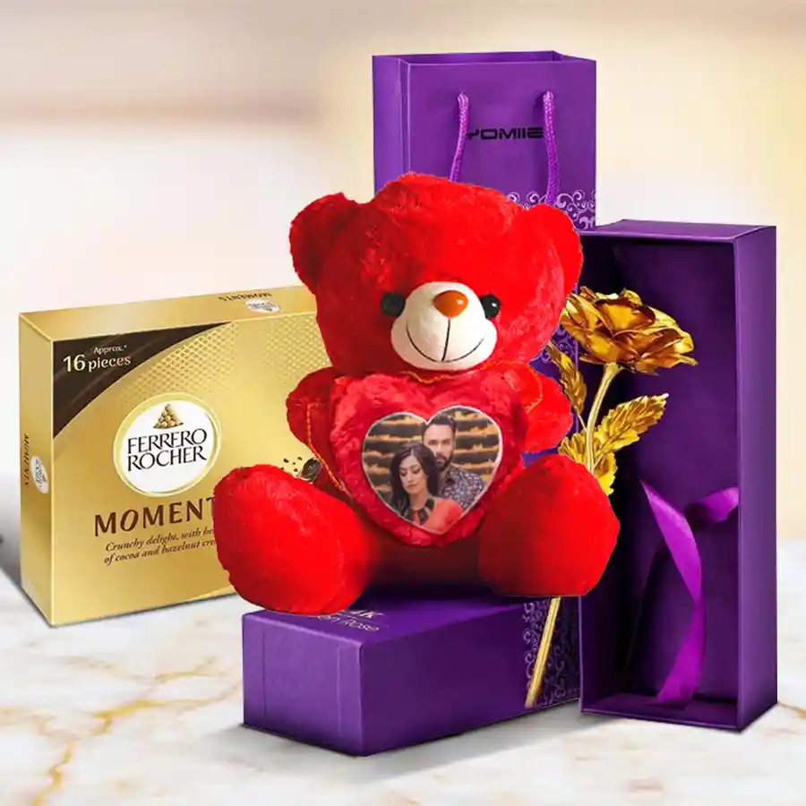 Personalized teddy bear with heart-shaped handle, golden rose, and box of Ferrero Rocher Moments