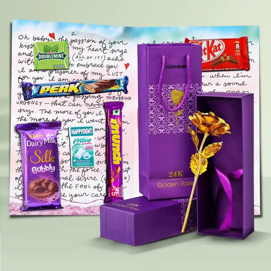Mixed chocolates with a personalized chocolate message card and a golden rose in an elegant gift set.