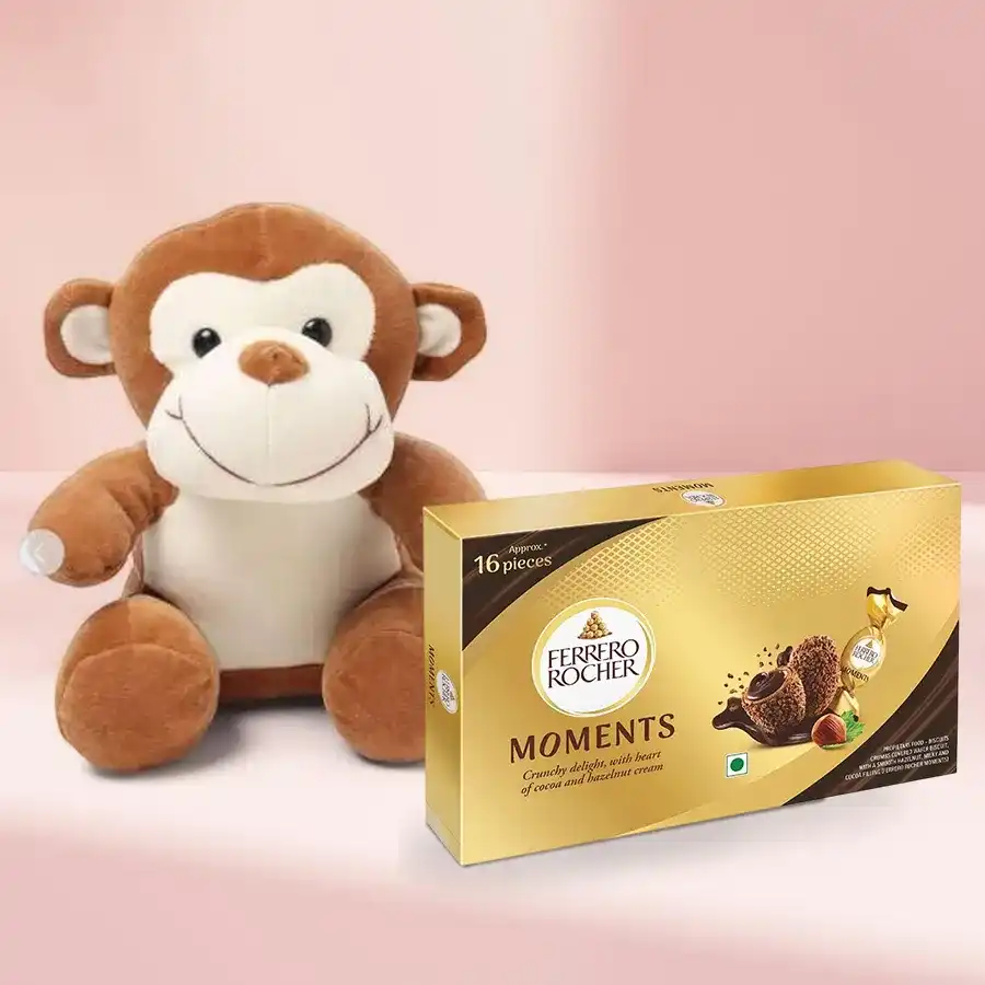 Monkey stuffed toy and Ferrero Rocher chocolates in a gift set.