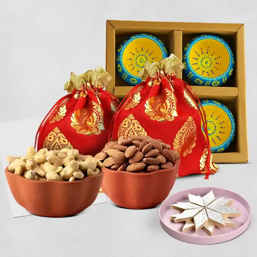 Ultimate Diwali Surprise Gift Box with cashews, almonds, Kaju Katli, and handcrafted clay diyas in designer jute potlis