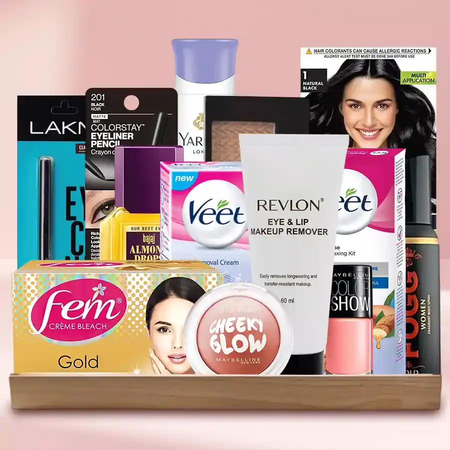 Grooming gift hamper featuring skincare products, makeup items, hair care products, and body sprays, beautifully arranged in a basket.