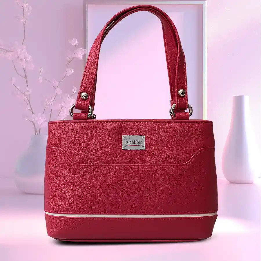 Lovely pink mini bag with a white border for ladies, featuring two compartments, crafted from faux leather.